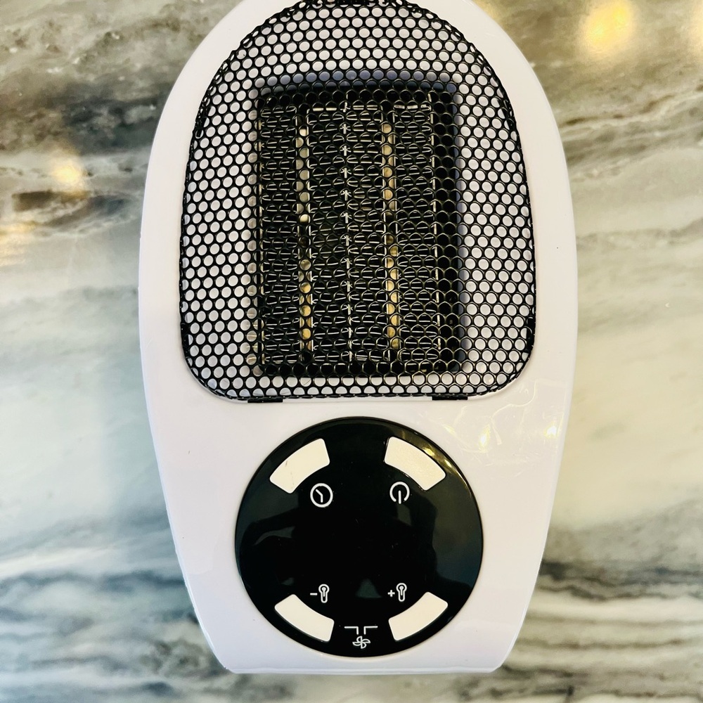 Compact White and Black Electric Heater
